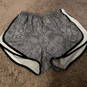Womens size medium Nike dry fit athletic shorts in black and white.